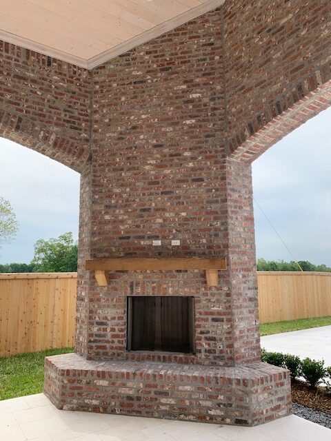 Brick masonry fireplace